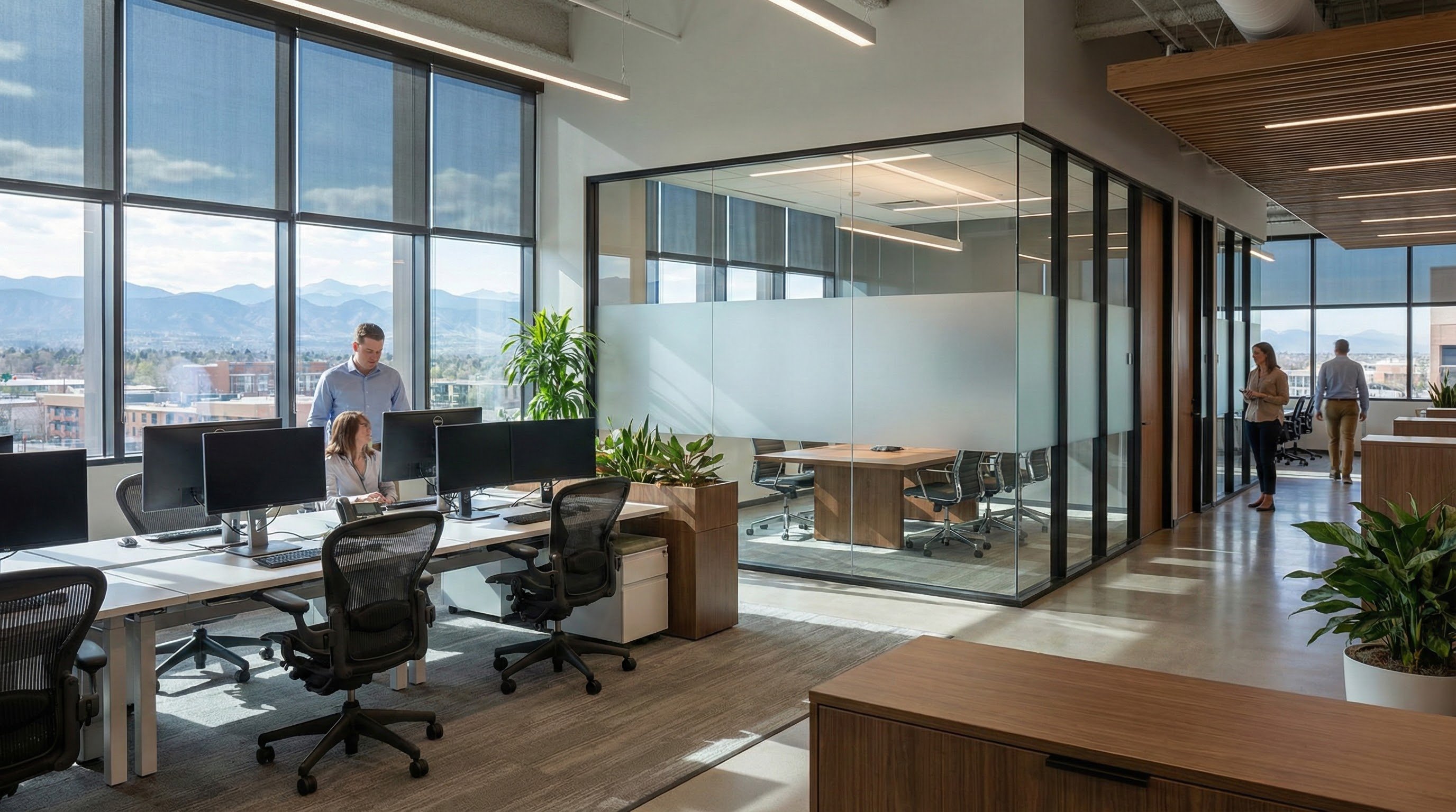Denver corporate office interior with tinted windows reducing glare on computer screens.