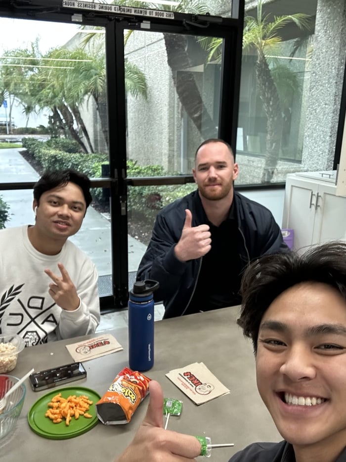 AWF teammates sharing lunch at the office