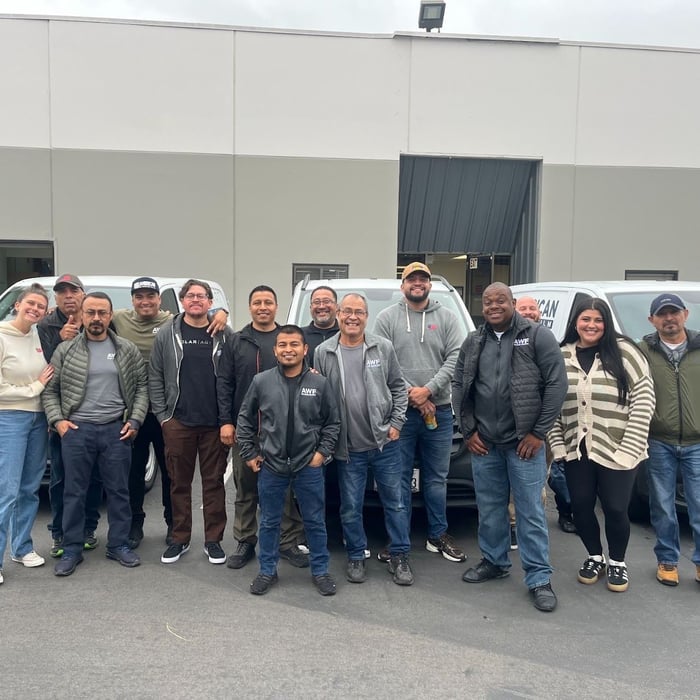 The Orange County team in front of the AWF vans