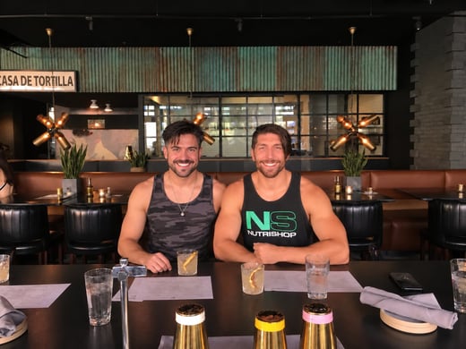 Matt and a friend out to dinner on Friends and Family Day