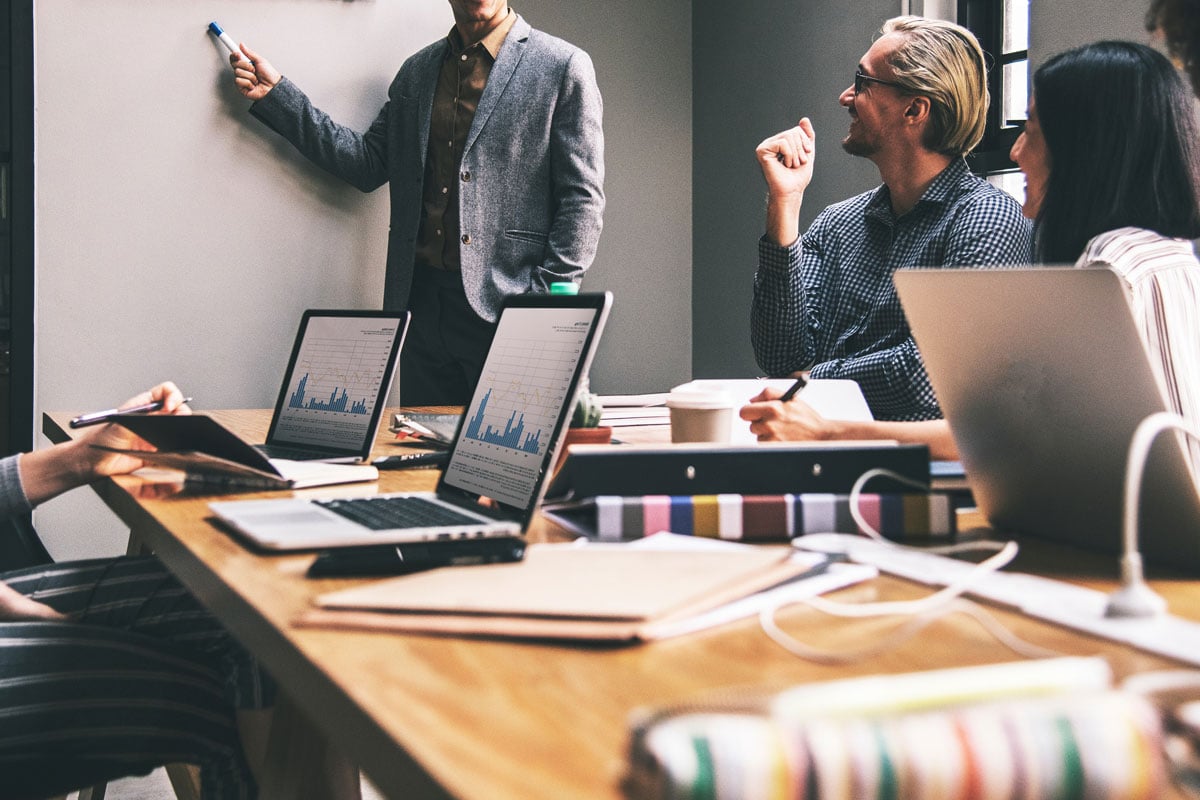 Communal desks make collaboration easier Communal desks make collaboration easier