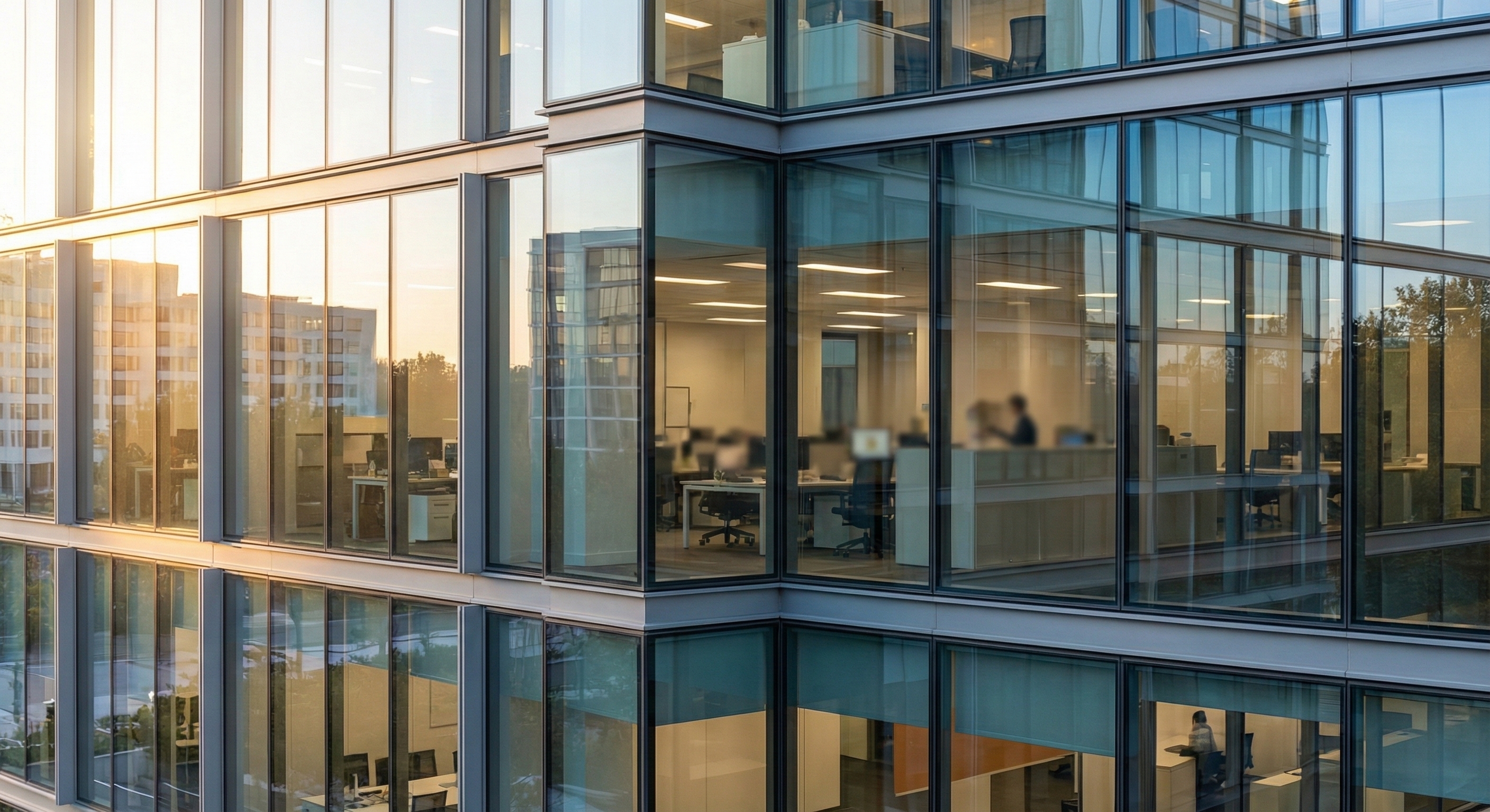 Commercial office windows with solar control film reducing solar heat gain