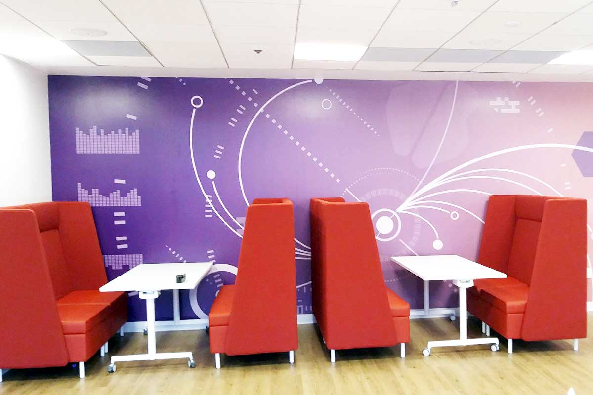 Custom wall graphics on cafeteria walls in office building