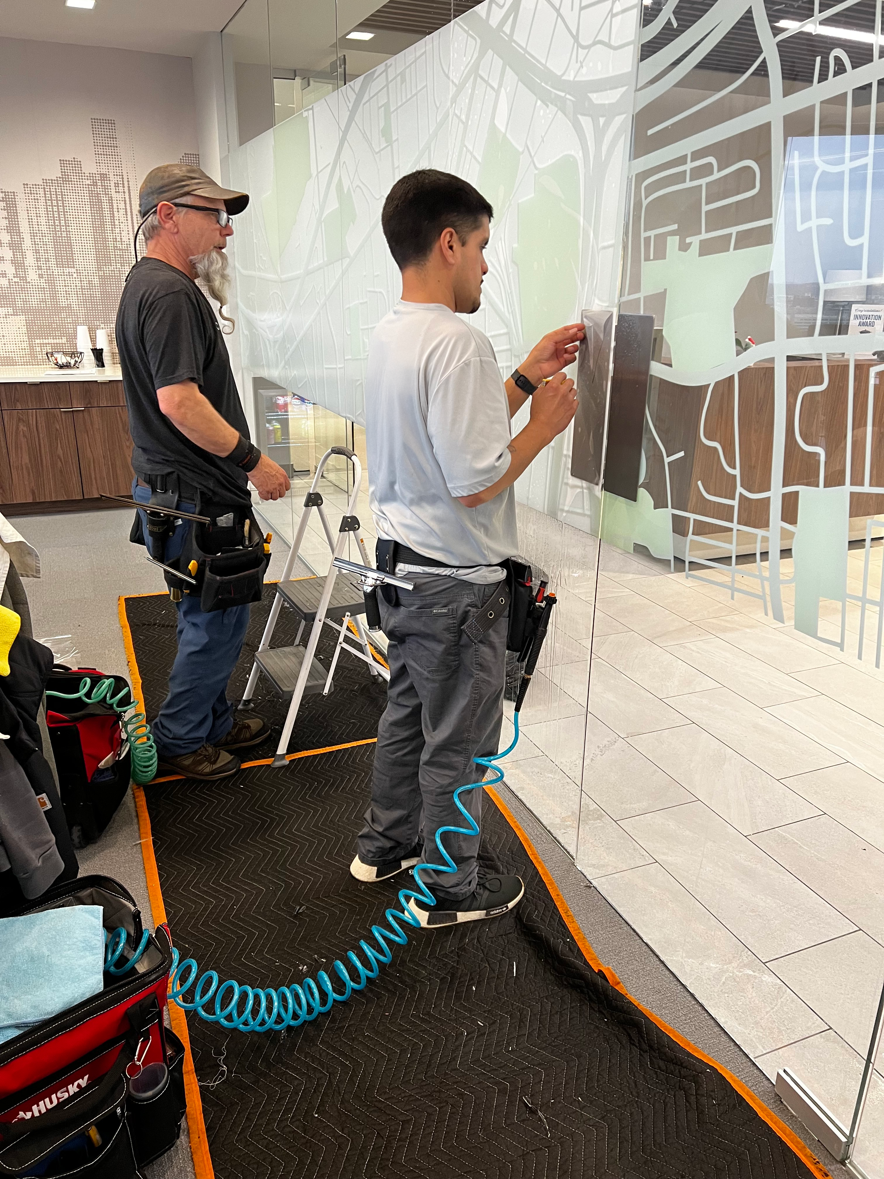 AWF window film installer at work