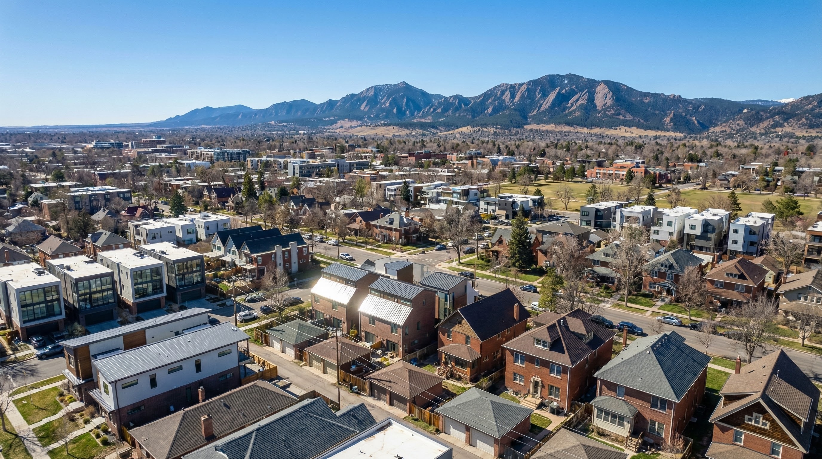 Aerial daylight view of Denver neighborhoods with residential homes and window glass